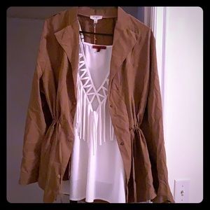 Tan jacket and buckle shirt